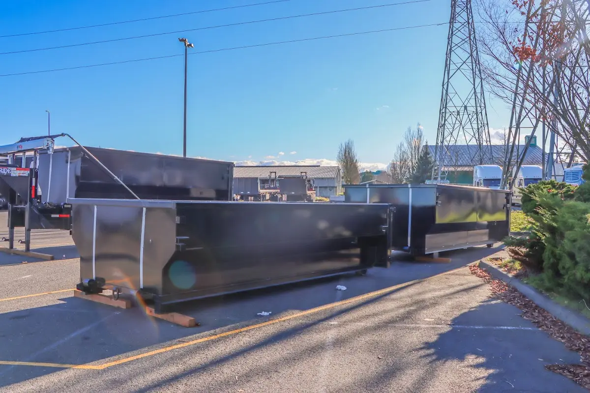 Roll-off dumpster ready for waste disposal at job site for 6 Yard Dumpster Rental in Lufkin
